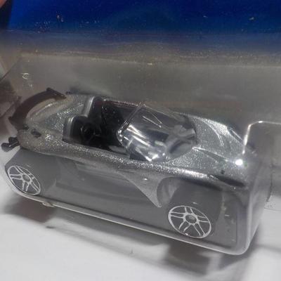 Hot wheels Lotus and Matchbox Ford explorer.