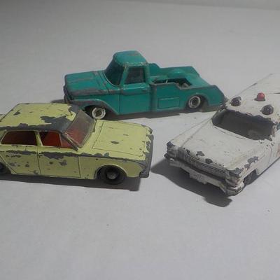 3- 50 y.o. classic cars.