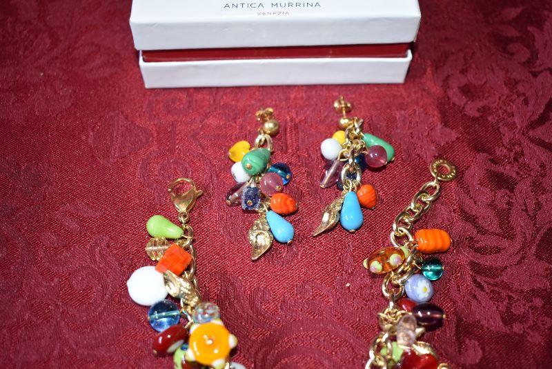 Lot 1044, Antica Murrina Glass Bead, Gold Tone Seashell Bracelet, Earrings  Murano Glass orig box | EstateSales.org