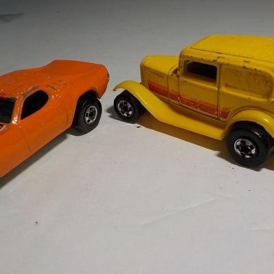1970 Plymouth hot wheels and 1986 MI car.