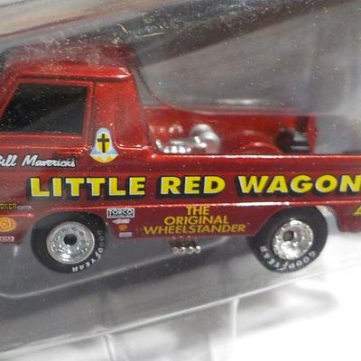Show stopper little red wagon and hot wheel Holden.