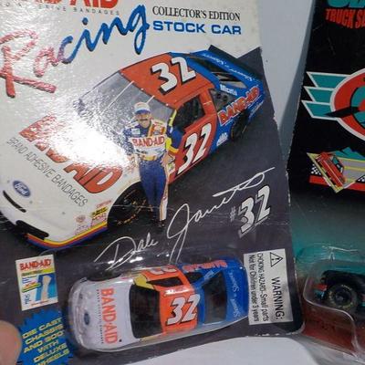 Stock car #32 band aid and New Hampshire Ford pu.