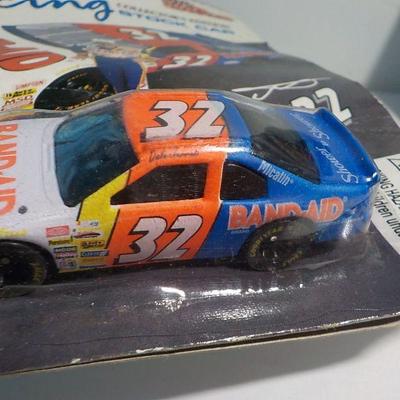 Stock car #32 band aid and New Hampshire Ford pu.