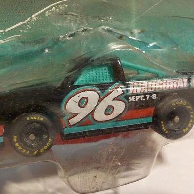 Stock car #32 band aid and New Hampshire Ford pu.
