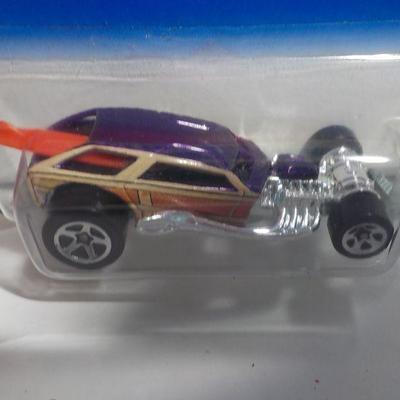 1993 edition of #21 and Hot wheels surf Crate 2000.