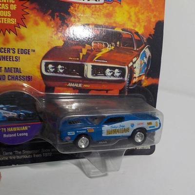 Hot wheels 33 ford roadster and Amalie Hawaiian.