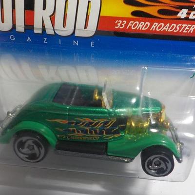Hot wheels 33 ford roadster and Amalie Hawaiian.