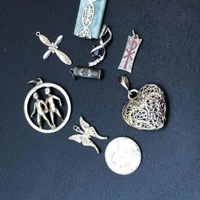 Lot of 9 Miscellaneous Sterling Silver Charms And Pendants