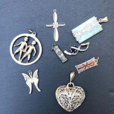 Lot of 9 Miscellaneous Sterling Silver Charms And Pendants