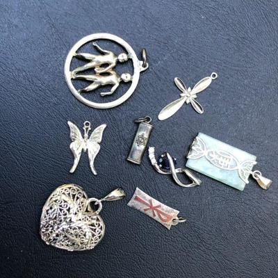 Lot of 9 Miscellaneous Sterling Silver Charms And Pendants