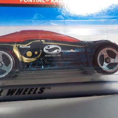 1996 Dragster new in pack and Pontiac Future car.
