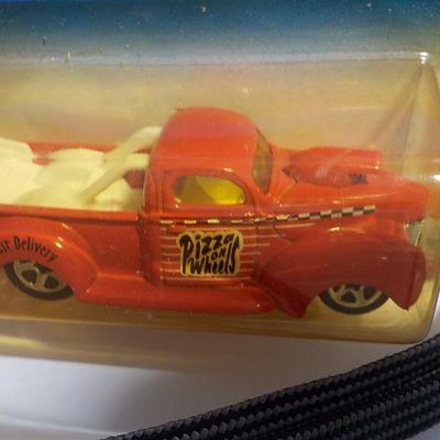 Ron Capps Dragster and coolest pizza delivery truck.