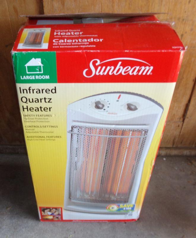 Lot 124 sunbeam electric heater estatesales