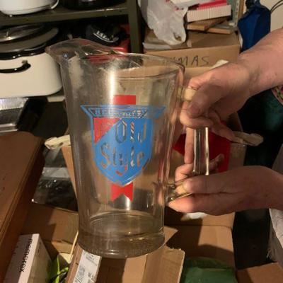 Old style glass beer pitcher 