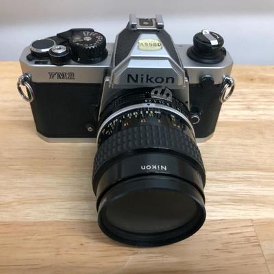 Nikon FM2 35MM Camera w/ Nikkor 55mm lens & Vivitar Zoom Lens Hoya Skylight & more