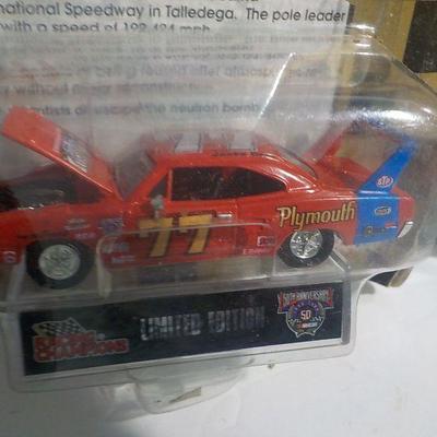 Racer #77 and Chevelle muscle car