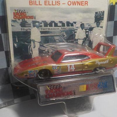 Bill Ellis # 14 muscle car and Kendall racing machine.