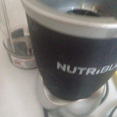 Nutri Bullet and 2 1 Qt. Ball Jars