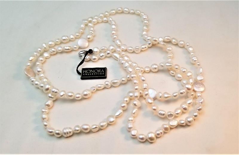 Lot #100 Lovely Long Strand of White Honora natural pearls ...