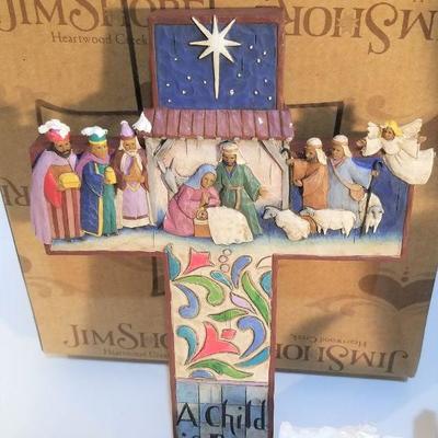 Lot #145  Two Piece Lot - Jim Shore Decorative Christmas Cross & Nativity Ornament Set