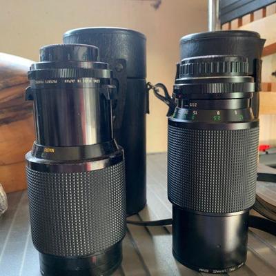 Two large telephoto lenses 
