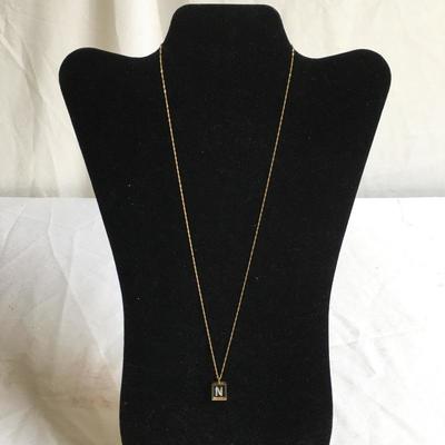 Lot 128 - Pair of 14K Necklaces with Pendants 