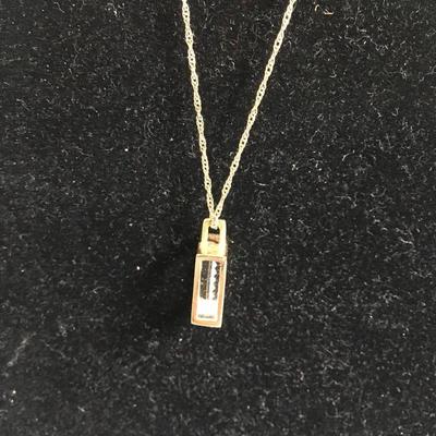 Lot 128 - Pair of 14K Necklaces with Pendants 