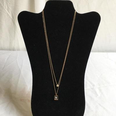 Lot 128 - Pair of 14K Necklaces with Pendants 