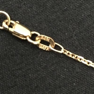 Lot 128 - Pair of 14K Necklaces with Pendants 