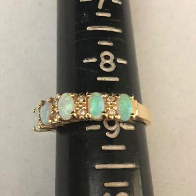 Lot 132 - Pair of 14K With Opals Rings