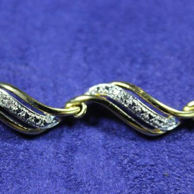 LOT#10: Stamped  PAJ-BB China Gold Toned Bracelet