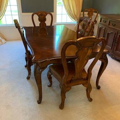 Bernhardt Dining Table w/6 Leather Seated Chairs and 2 additional Leaves and Pads $1,800.00