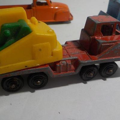 Vintage Midge toys, tootsie vehicles. and a GODDEE.