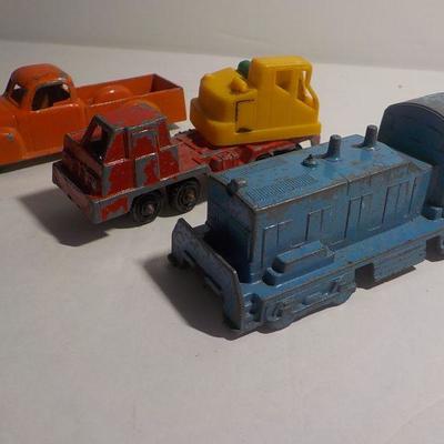 Vintage Midge toys, tootsie vehicles. and a GODDEE.