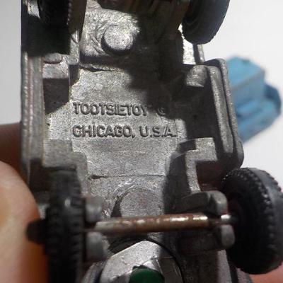 Vintage Midge toys, tootsie vehicles. and a GODDEE.