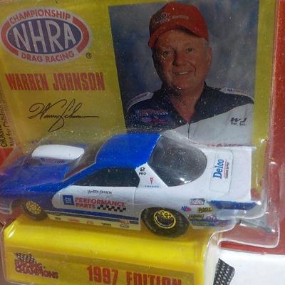 NHRA  " Warren Johnson" Racer and Waste management truck.