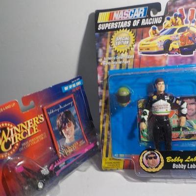 Top female fuel dragster and Bobby Labonte figure.
