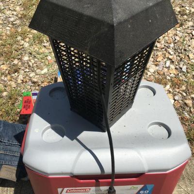 Red coleman ice chest rarely used and bug zapper!!