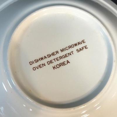 2 blue and white delft bowls small and large