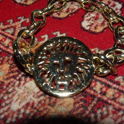 1980's Iconic ANNE KLEIN Signature LION's Head Logo Charm Carved Gold Metal Bracelet