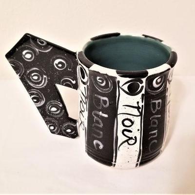 Lot #54  Studio Pottery Mug by New Orleans artist Ellin Egan