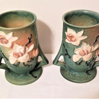 Lot #82  Pair of vintage ROSEVILLE vases in Magnolia Pattern