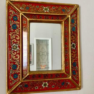 LOT 61 SMALL MIRROR WITH RED PAINTED FRAME FOLKART