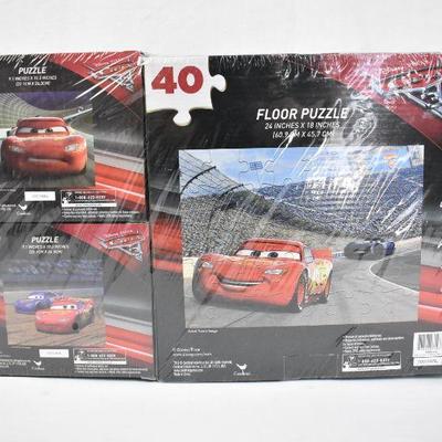 Disney Cars 3 Puzzle Pack, Set of 3 Puzzles, 40 pc, 24 pc, 24 pc - New