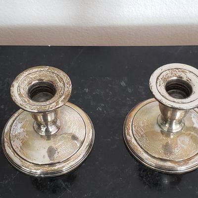 Lot 169: Pair of Sterling Candle holders 