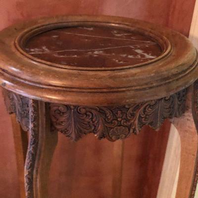 D9:Highly ornate carved wood pedestal w/ marble top. 