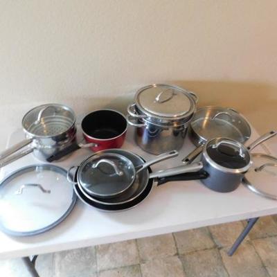 Large Collection of Pots, Pans, and Skillets of Various Size and Brands 