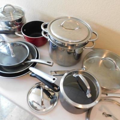 Large Collection of Pots, Pans, and Skillets of Various Size and Brands 