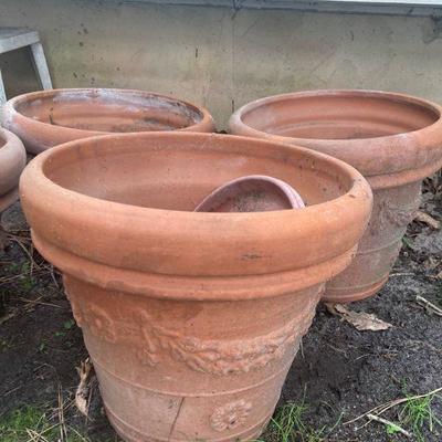 Lot S18: Set of four terra-cotta planters