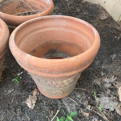 Lot S18: Set of four terra-cotta planters